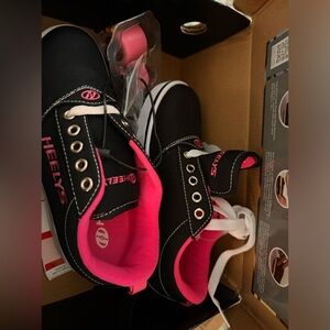 Never worn Healy’s Wheeled Shoes- youth size 2 NWT